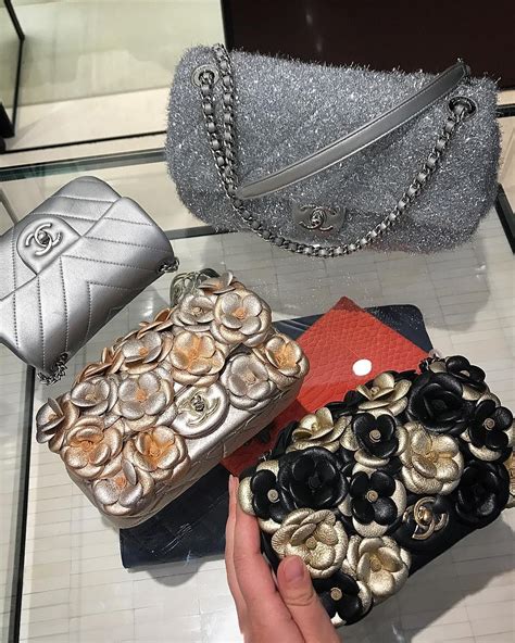 chanel flower vase - Chanel camellia bag.